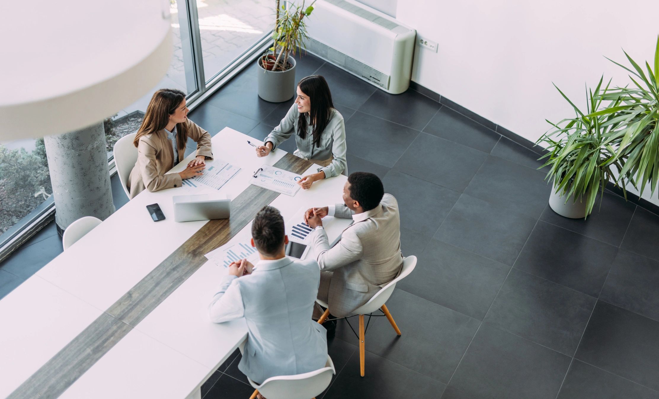 Consultant presenting to executives during a working session